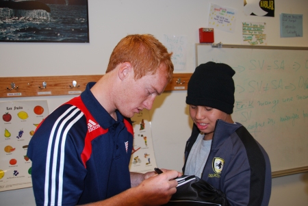 Jeff Larentowicz Signing Autographs for Project GOAL students